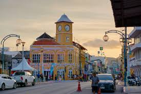 Phuket city tour (Wat Chalong + Kata Karon View Point + Gems Gallery) on PVT (04 Hrs)